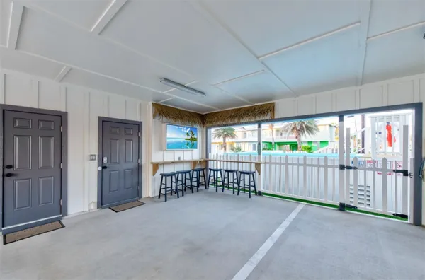 a view of outdoor space pool patio and outdoor kitchen