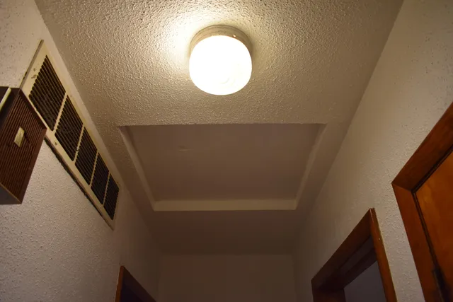 a view of livingroom with washer and dryer
