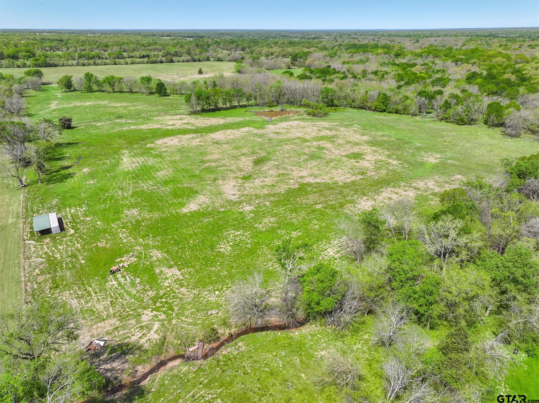902 County Road 3710 Edgewood, TX 75117 - Photo 11 of 41 a view of an outdoor space with a lake view