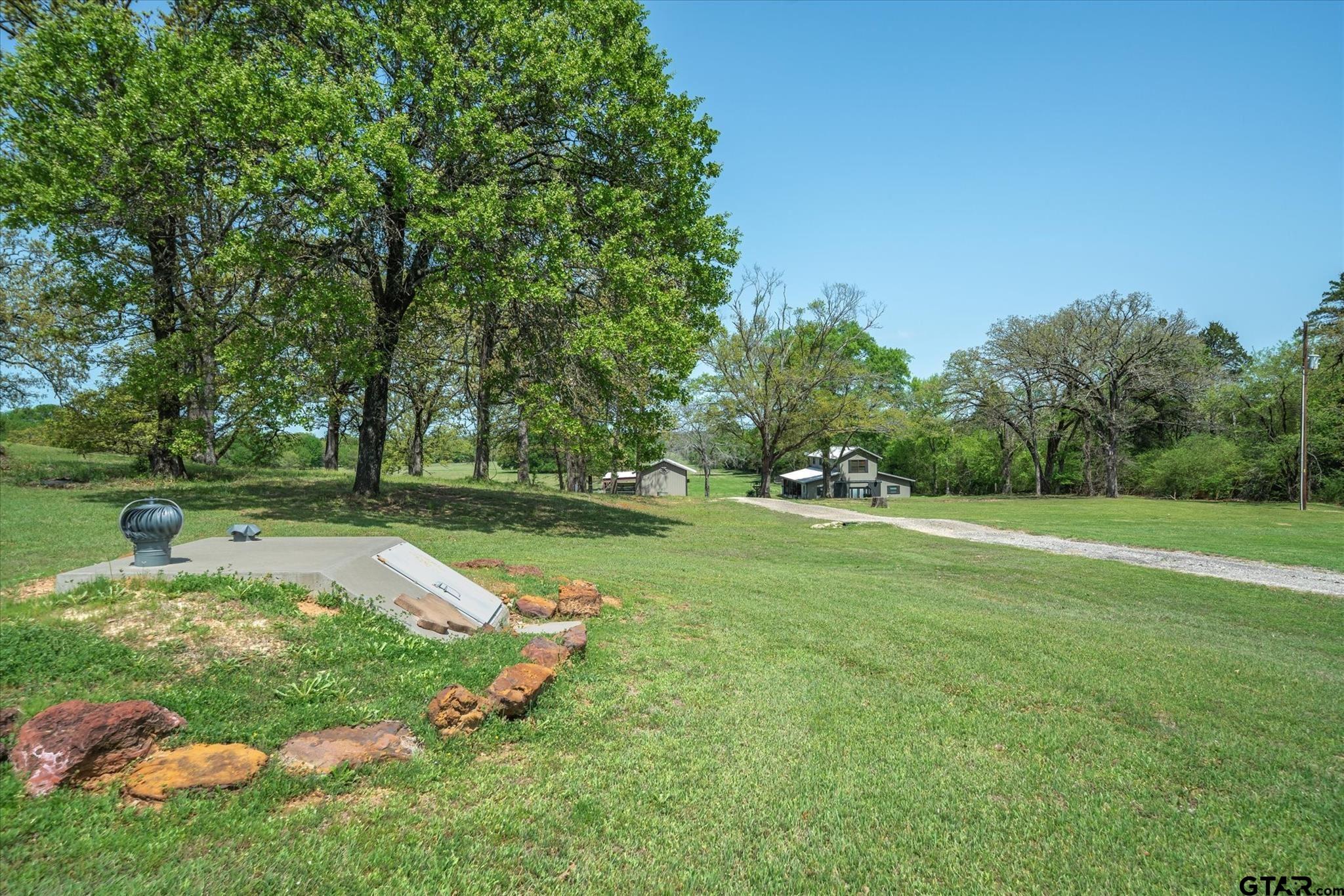 902 County Road 3710 Edgewood, TX 75117 - Photo 15 of 41 a view of a park with large trees