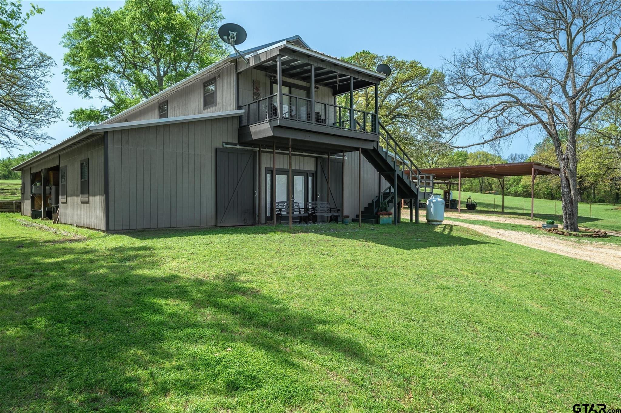 902 County Road 3710 Edgewood, TX 75117 - Photo 19 of 41 a view of a house with a yard
