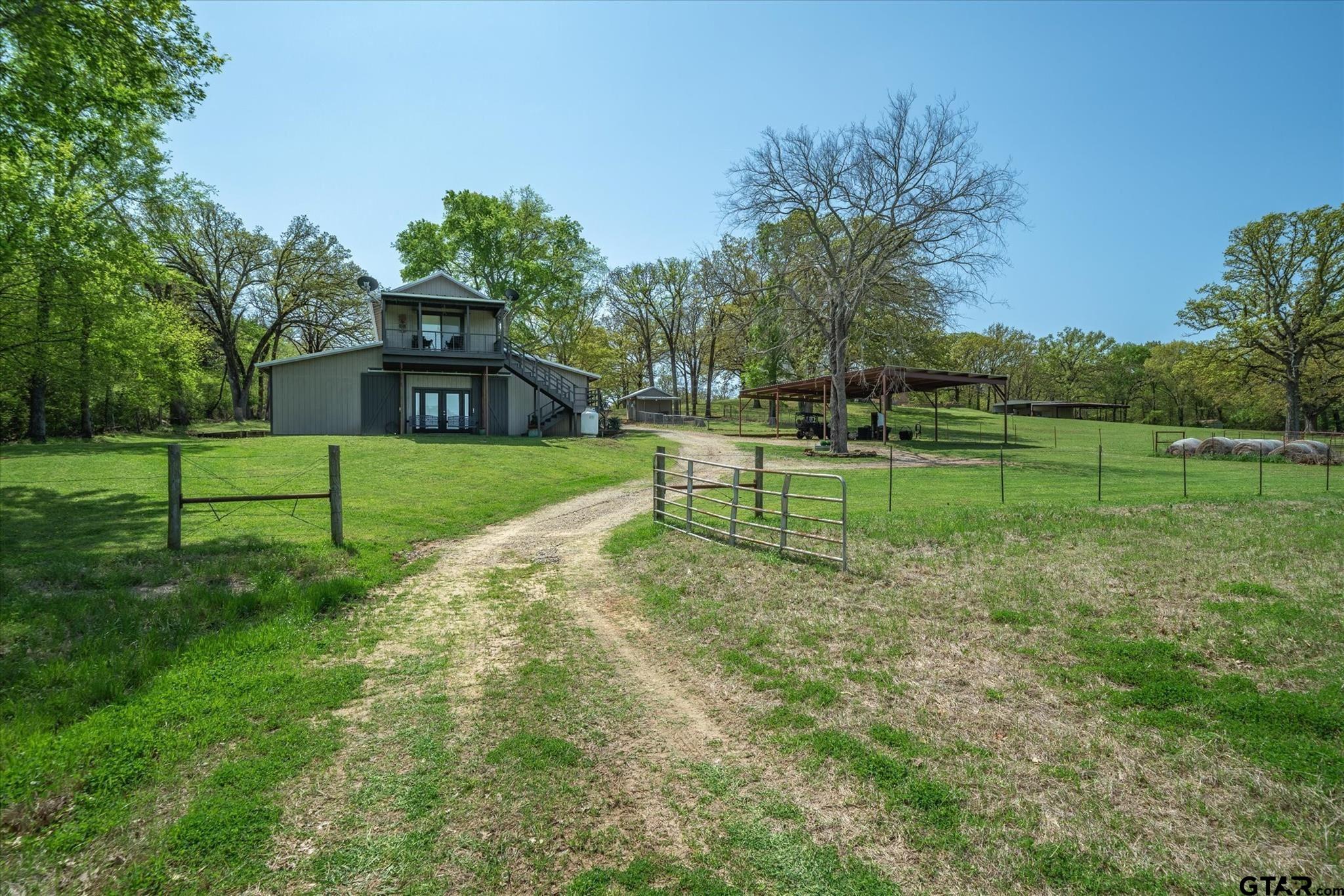 902 County Road 3710 Edgewood, TX 75117 - Photo 20 of 41 a view of a park with a large tree