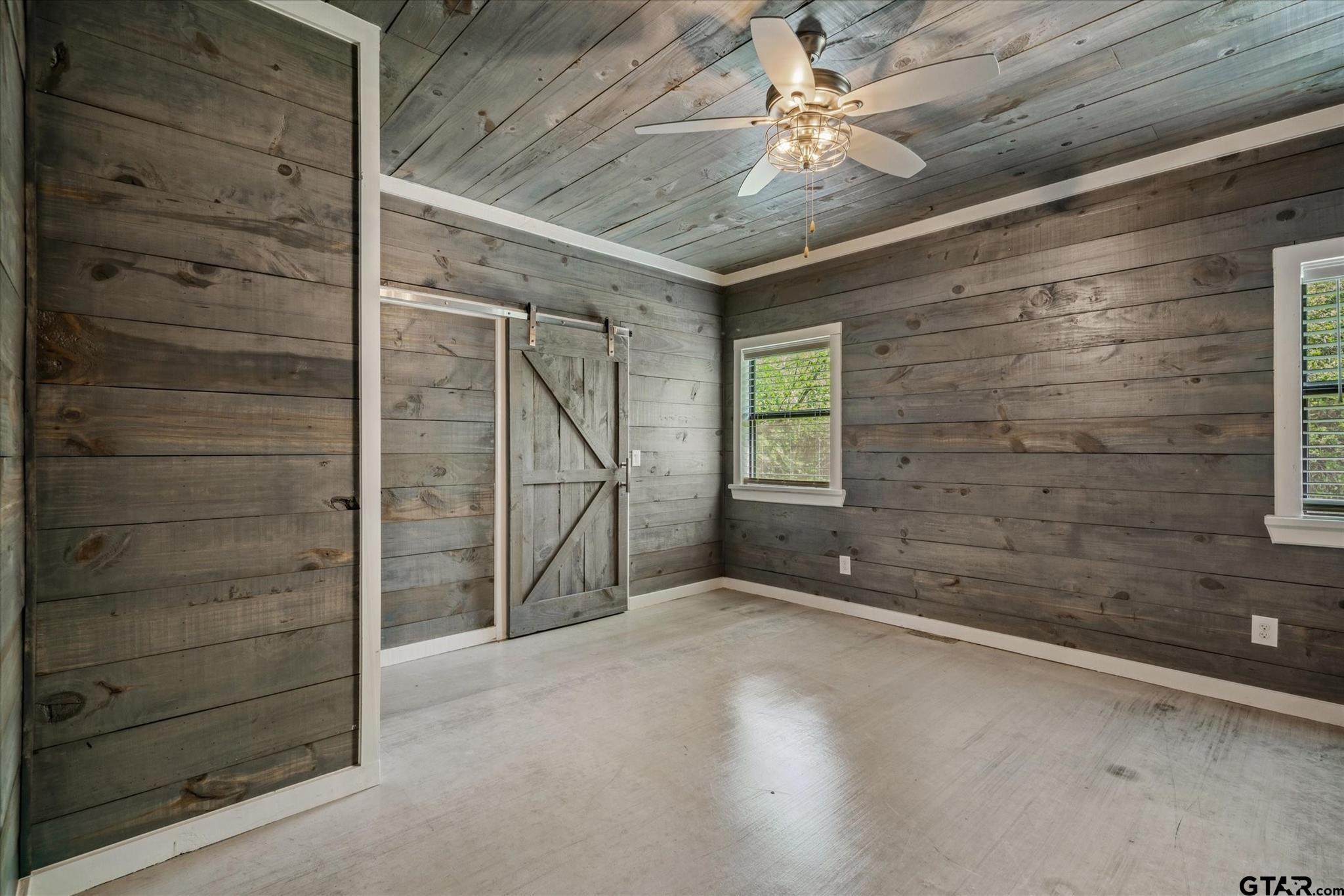 902 County Road 3710 Edgewood, TX 75117 - Photo 23 of 41 a view of an empty room with a fireplace