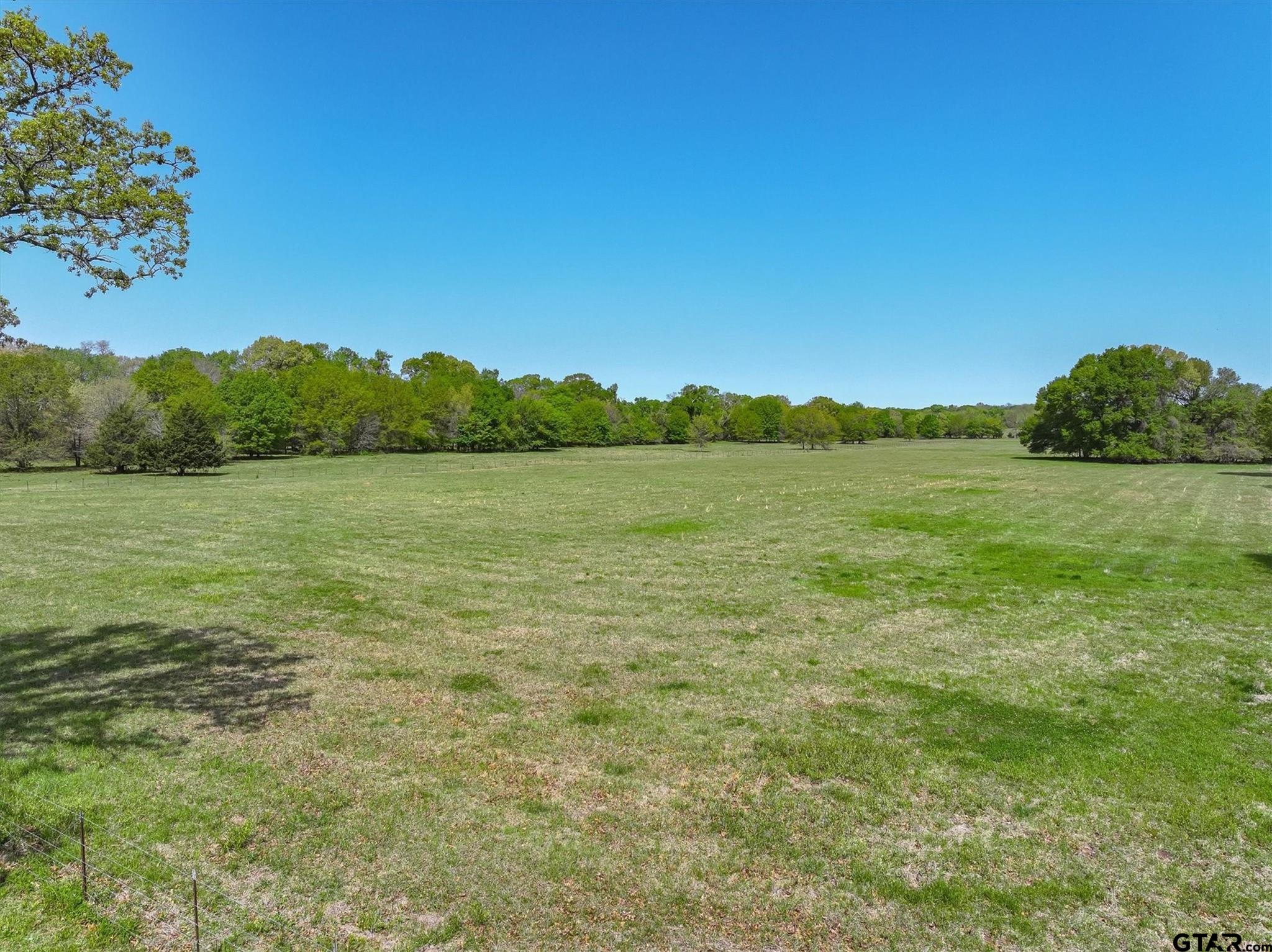 902 County Road 3710 Edgewood, TX 75117 - Photo 6 of 41 a view of an ocean from a yard