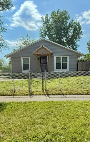 a house view with a garden space