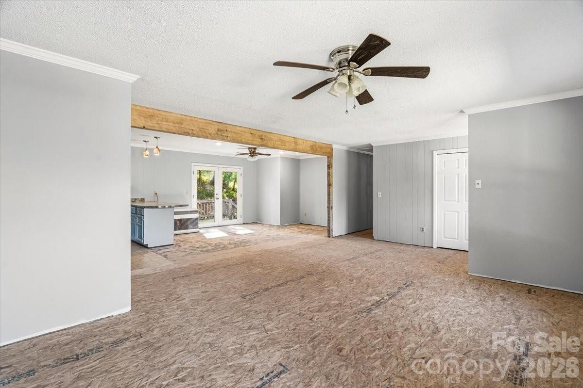 14 Jack Sullins Road Spruce Pine, NC 28777 - Photo 11 of 37 a view of a livingroom with a ceiling fan and window