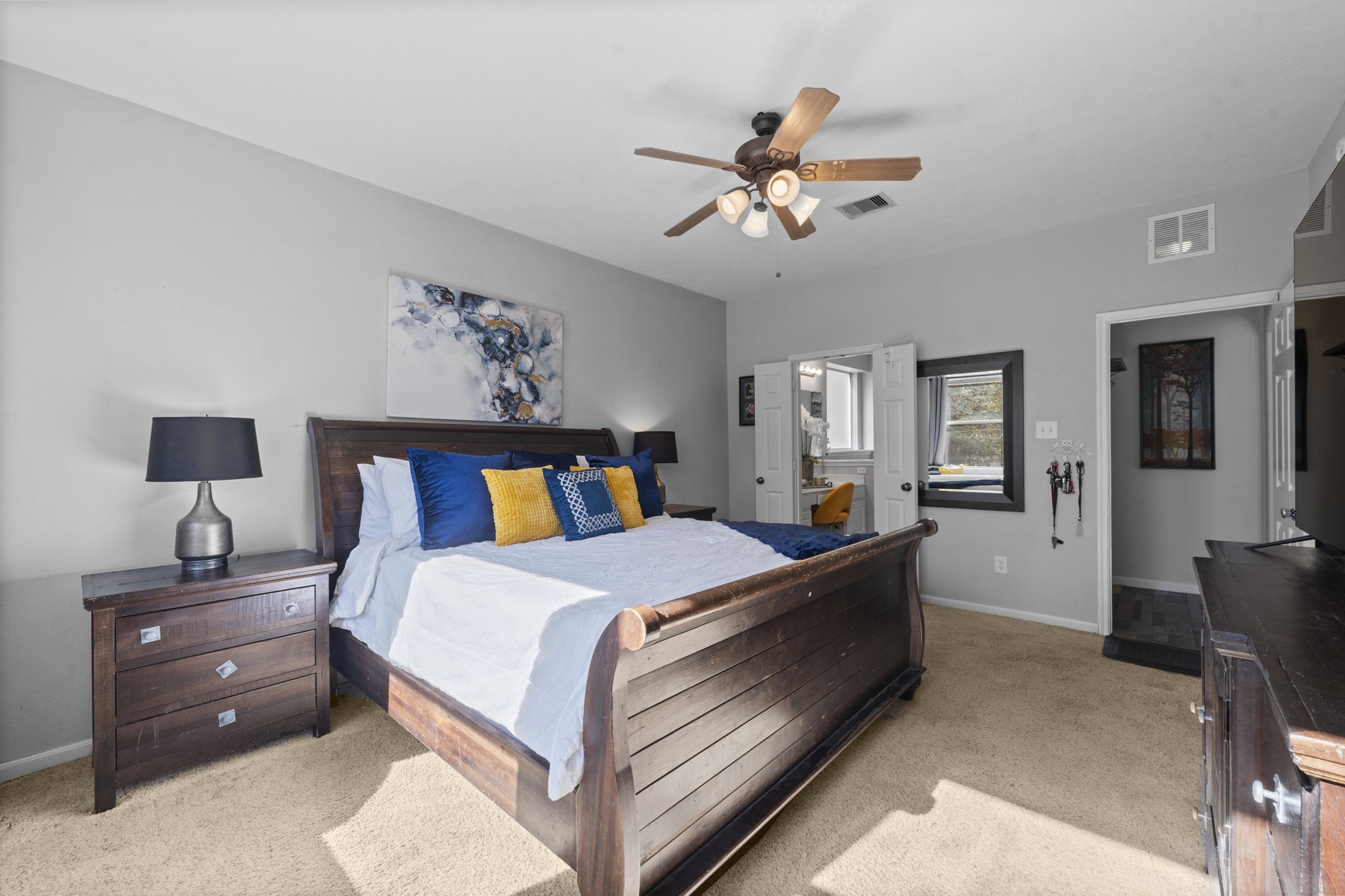 9011 Cedar Run Falls Tomball, TX 77375 - Photo 14 of 30 a bed room with a bed and a chandelier