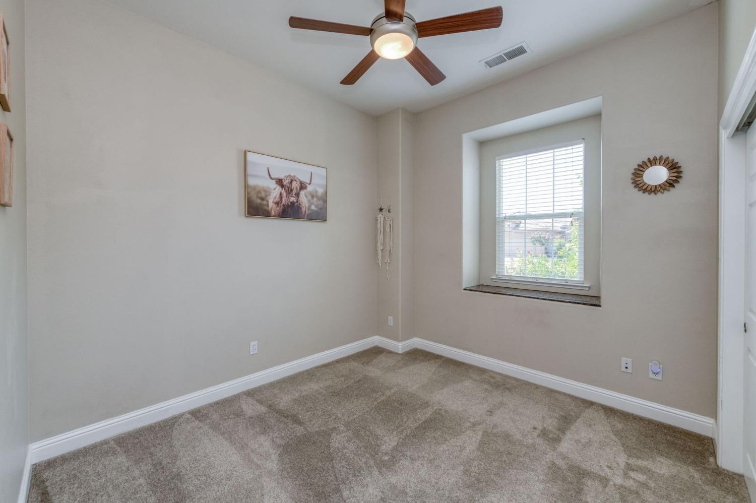 3275 Keats Avenue Clovis, CA 93619 - Photo 20 of 36 a view of an empty room with a window