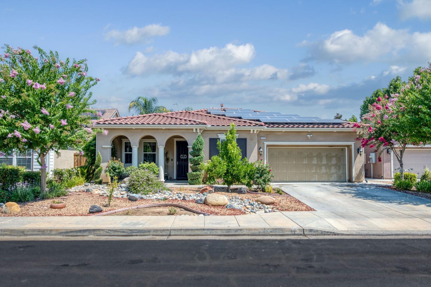 3275 Keats Avenue Clovis, CA 93619 - Photo 2 of 36 a view of a house with a yard and front view of a house