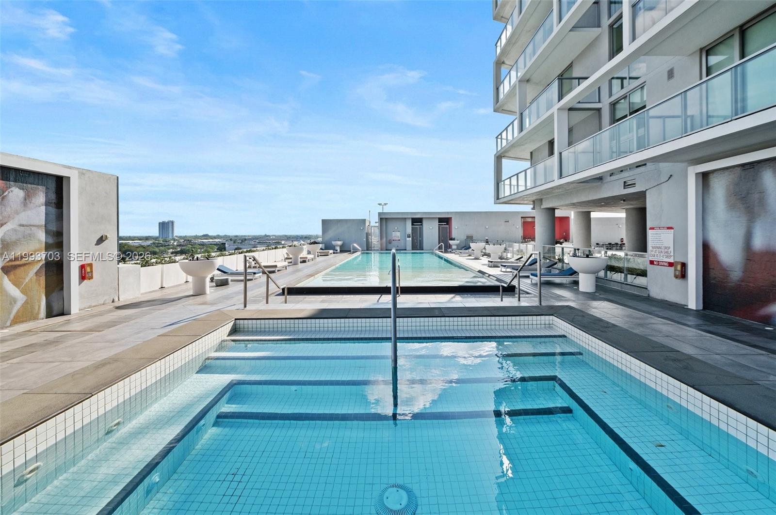 2000 Metropica Way, Unit 508 Sunrise, FL 33323 - Photo 18 of 25 a view of a balcony with sitting area