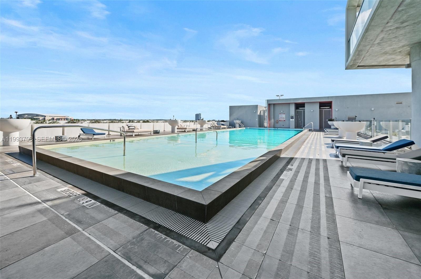 2000 Metropica Way, Unit 508 Sunrise, FL 33323 - Photo 19 of 25 a view of a roof deck with furniture