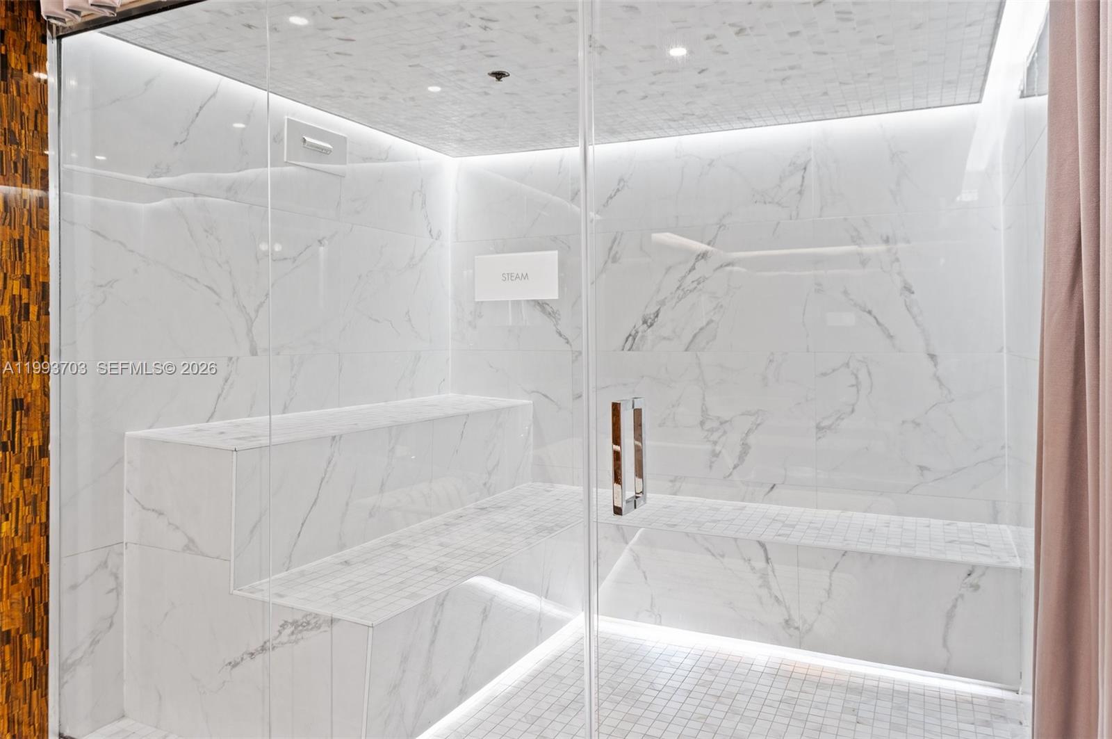 2000 Metropica Way, Unit 508 Sunrise, FL 33323 - Photo 23 of 25 a close up of a bathtub in a bathroom