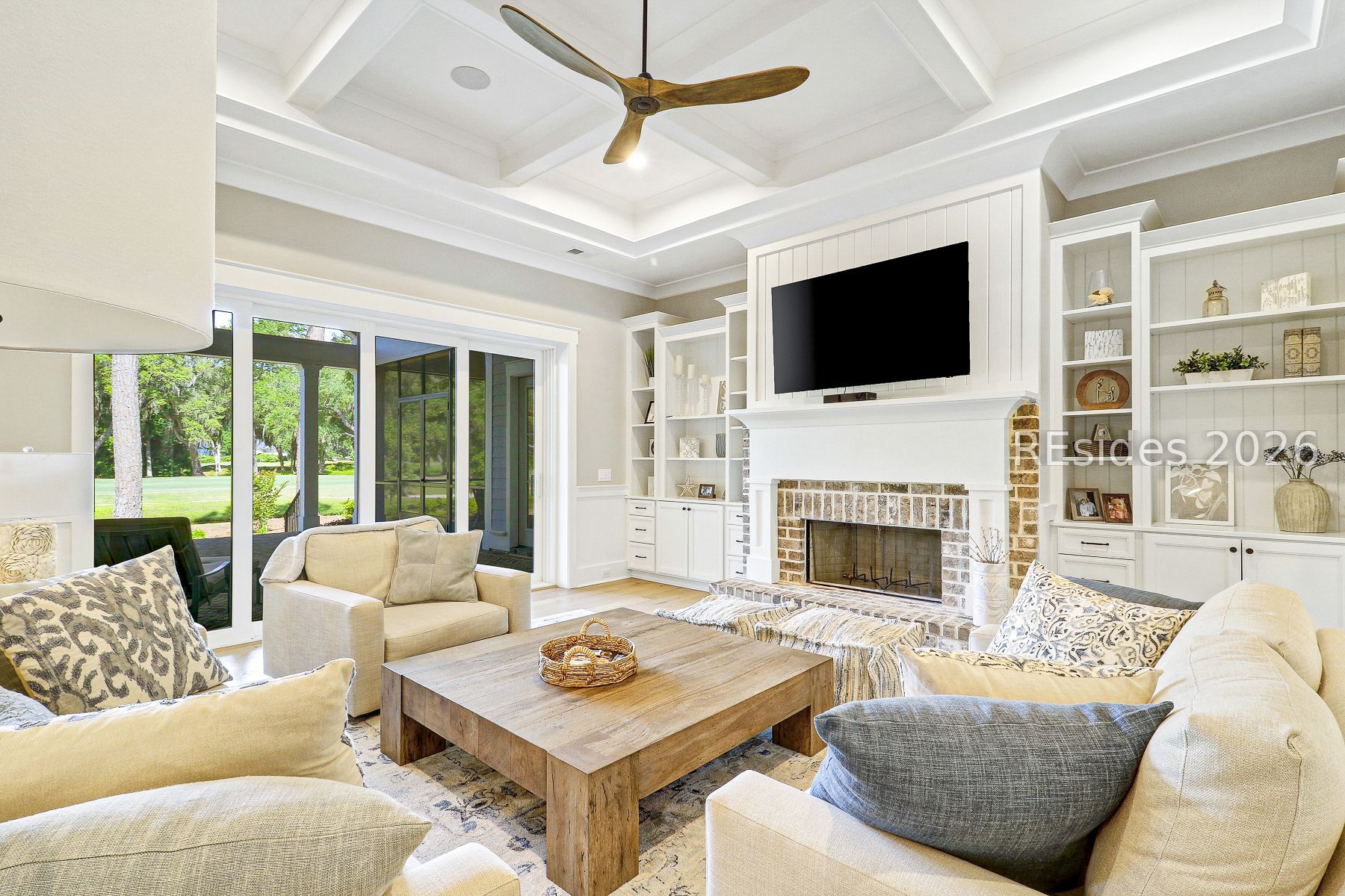 18 Ballybunion Way Bluffton, SC 29910 - Photo 10 of 64 Great room with fireplace and golf views
