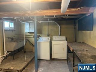 2-38 33rd Street Fair Lawn, NJ 07410 - Photo 18 of 22 a utility room with dryer and washer