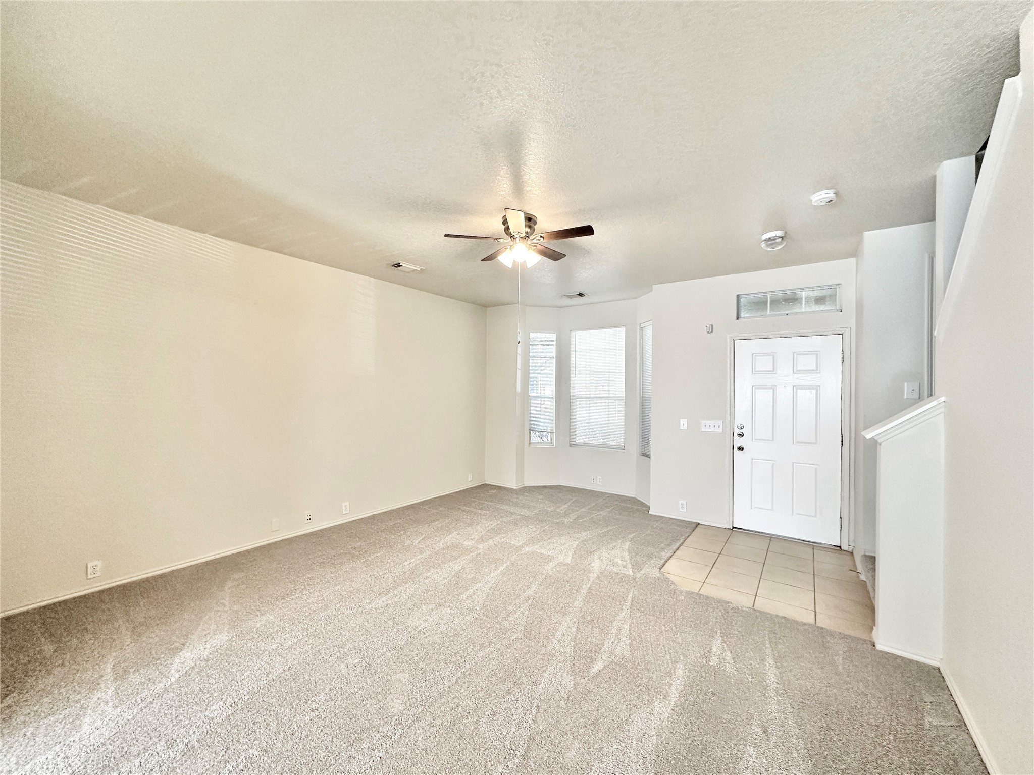 29709 Valley Center Drive Spring, TX 77386 - Photo 7 of 15 a view of a livingroom with a ceiling fan and window