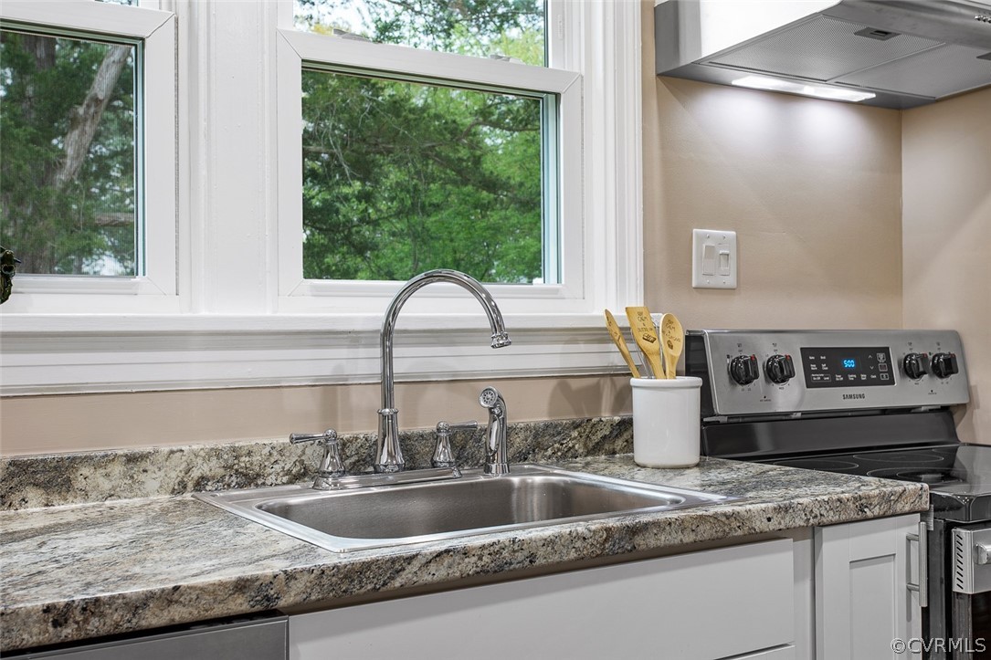 1 David Drive Henrico, VA 23229 - Photo 11 of 35 a kitchen with a sink and a large window