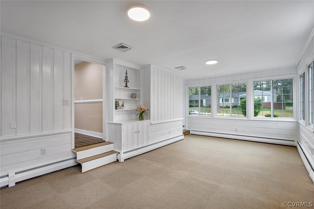 1 David Drive Henrico, VA 23229 - Photo 14 of 35 a view of an empty room with a fireplace and window