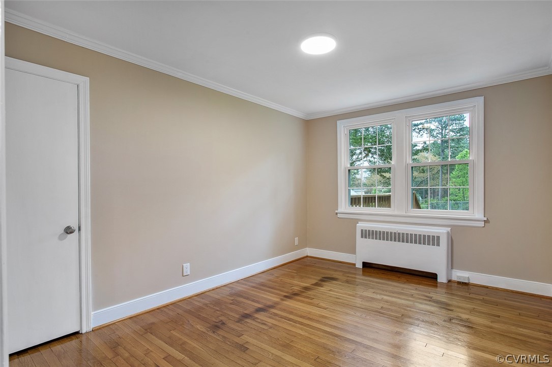 1 David Drive Henrico, VA 23229 - Photo 20 of 35 a view of an empty room with wooden floor and a window
