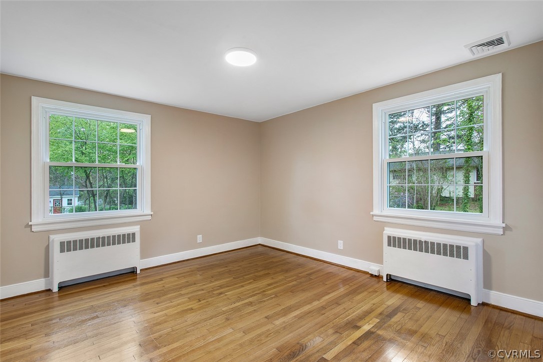 1 David Drive Henrico, VA 23229 - Photo 21 of 35 a view of an empty room with a window and wooden floor