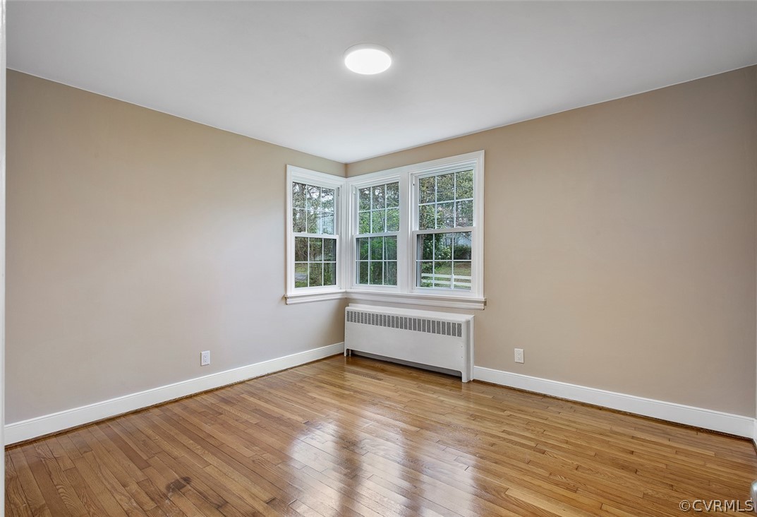 1 David Drive Henrico, VA 23229 - Photo 24 of 35 a view of an empty room with wooden floor and a window