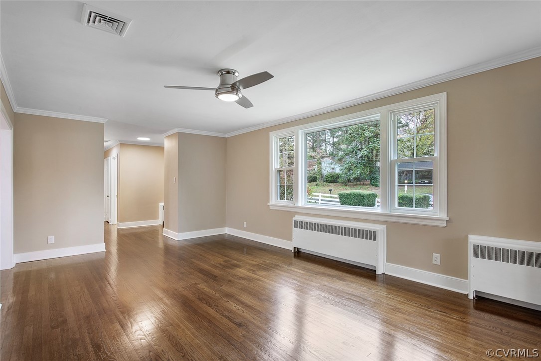 1 David Drive Henrico, VA 23229 - Photo 5 of 35 a view of an empty room with wooden floor and a window
