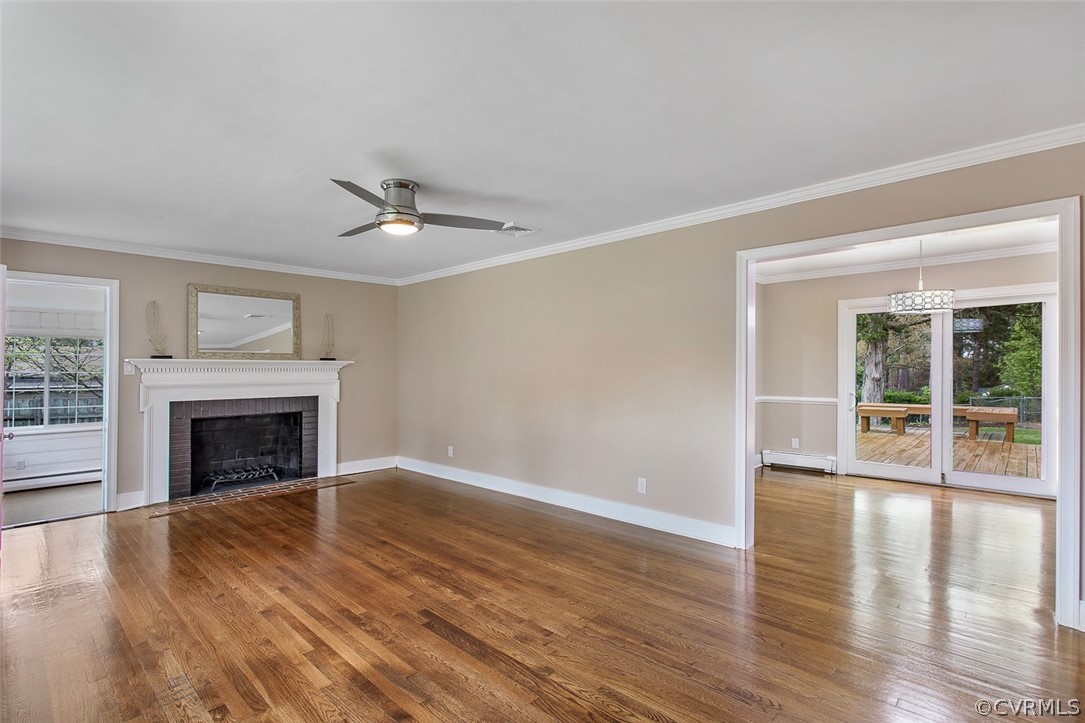 1 David Drive Henrico, VA 23229 - Photo 6 of 35 wooden floor fireplace and windows in an empty room