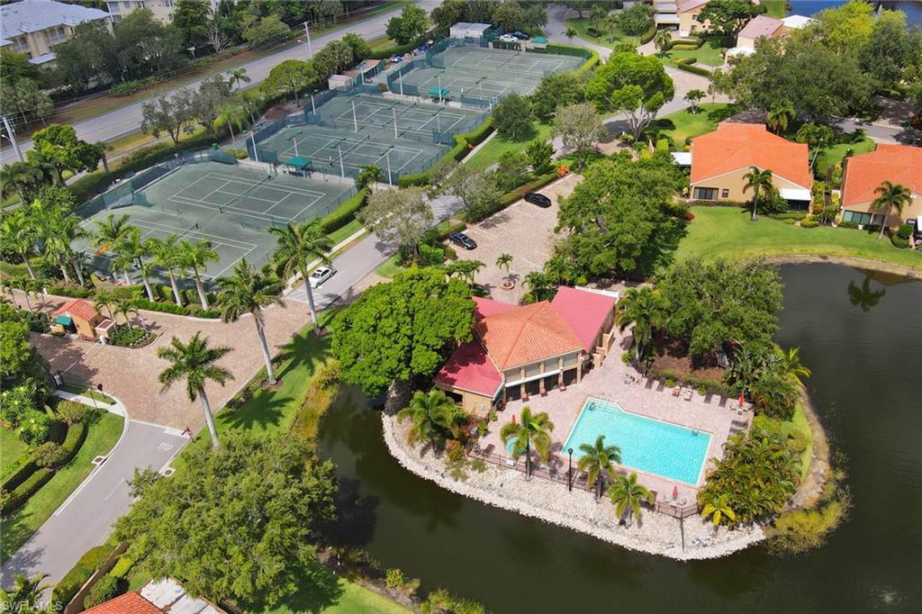 716 Reef Point Circle Naples, FL 34108 - Photo 9 of 15 an aerial view of a house with a lake view