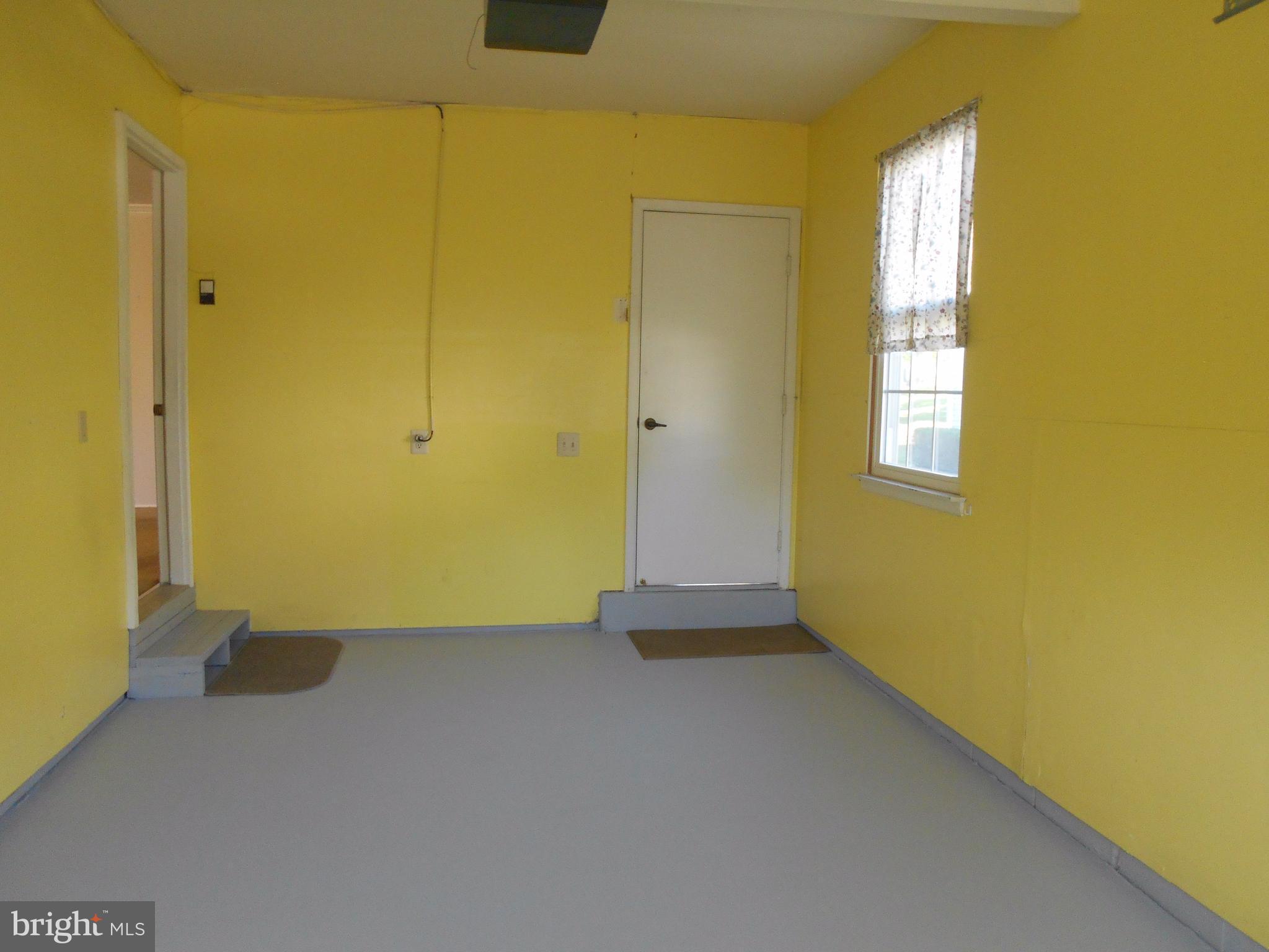 7070 Catalpa Road Frederick, MD 21703 - Photo 22 of 26 an empty room with windows