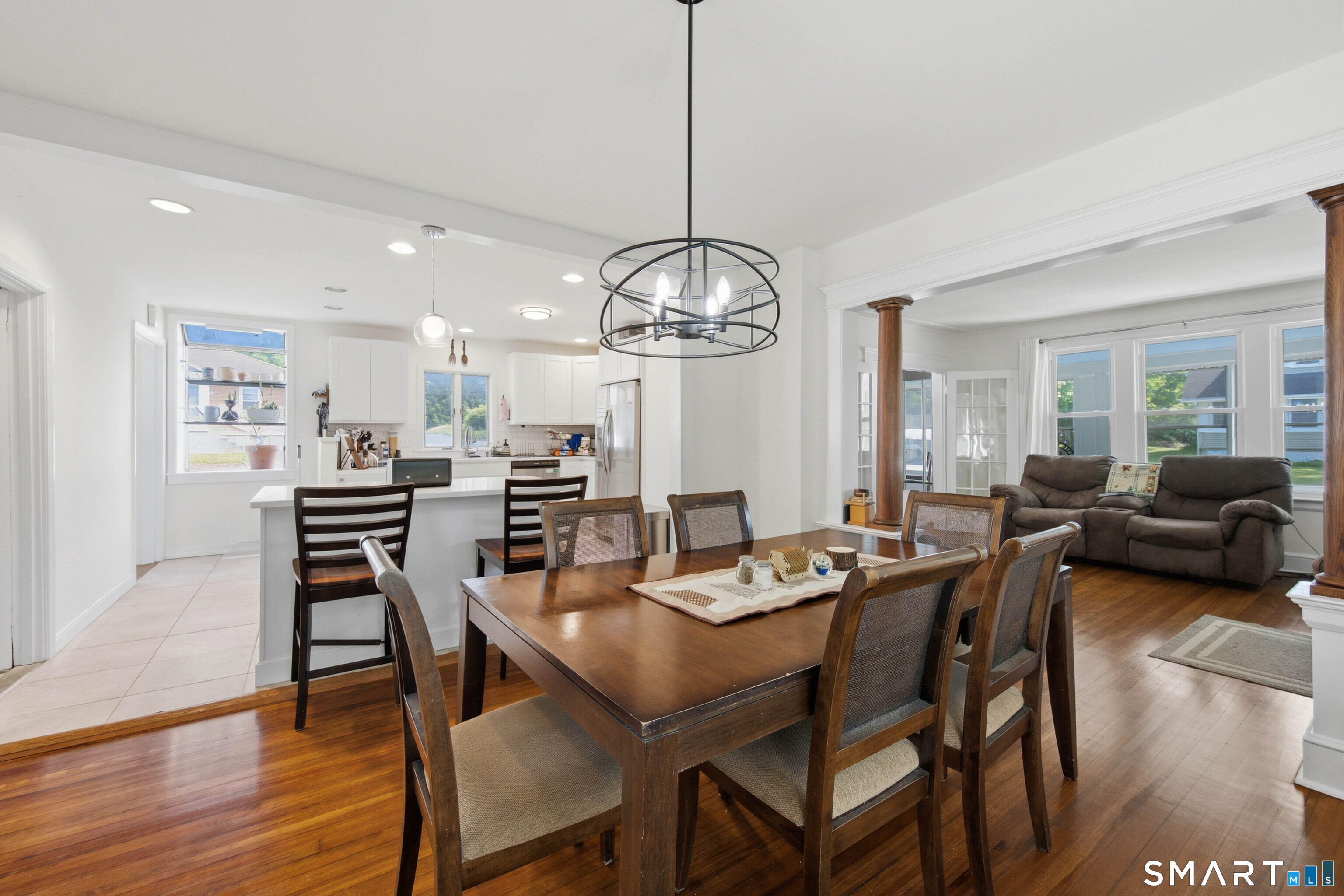 120 May Street Naugatuck, CT 06770 - Photo 9 of 31 a view of a dining room with furniture a rug and wooden floor