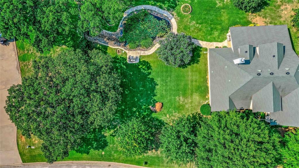 2108 Turtlecreek Denison, TX 75020 - Photo 16 of 16 an aerial view of residential house with outdoor space and trees all around