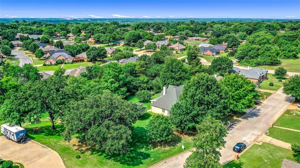 2108 Turtlecreek Denison, TX 75020 - Photo 4 of 16 a view of a garden with a building in front of it