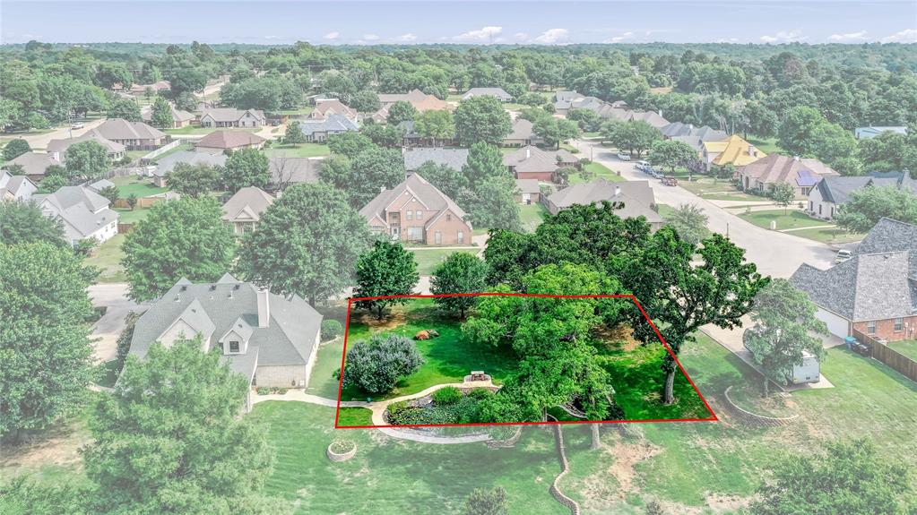 2108 Turtlecreek Denison, TX 75020 - Photo 7 of 16 an aerial view of residential houses with outdoor space and trees