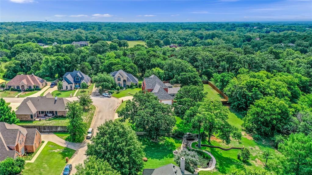 2108 Turtlecreek Denison, TX 75020 - Photo 9 of 16 an aerial view of residential houses with outdoor space and trees all around