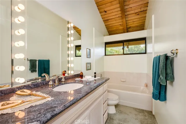 a view of a house with a porch and wooden floor