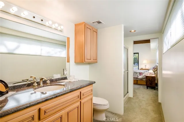 a utility room with sink dryer and washer