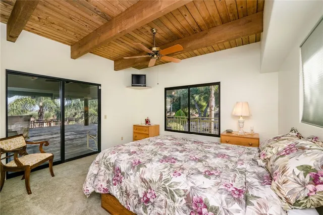 a bathroom with a sink a mirror and a vanity