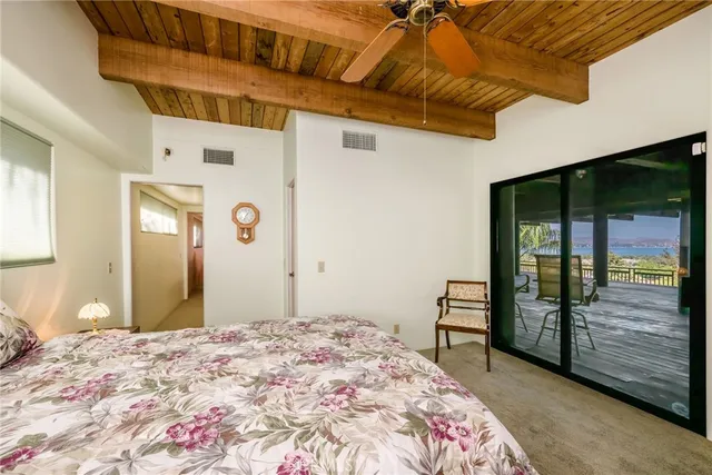 a view of a balcony with wooden floor