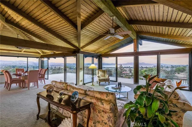 a white stove top oven sitting inside of a kitchen