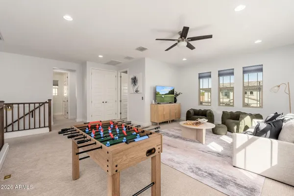 a bathroom with a sink a vanity and a mirror