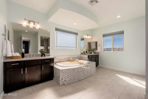 a view of a chairs and table in a patio