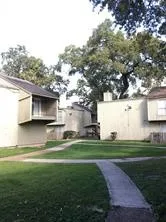 a view of a house with a big yard