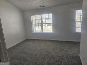 9432 Lakeview Road Union City, GA 30291 - Photo 9 of 11 an empty room with a window