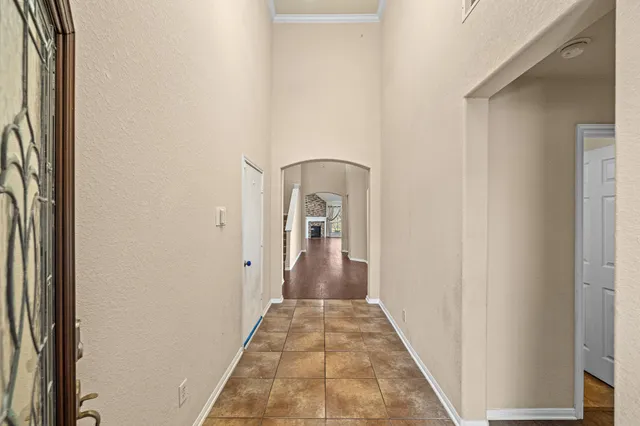 a view of a hallway with a door