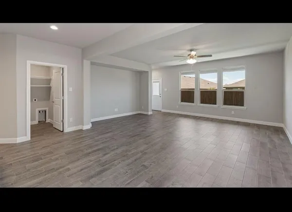 a view interior of a house wooden floor and windows in a room