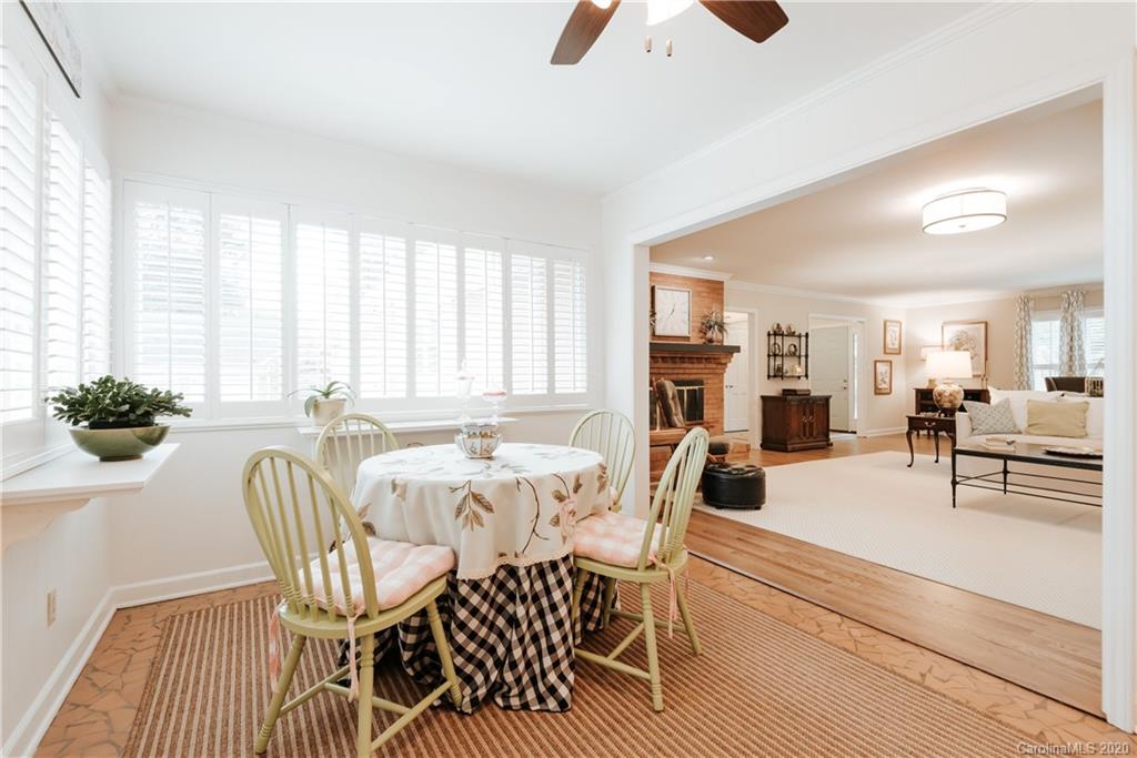 1001 Lansdowne Road Charlotte, NC 28270 - Photo 17 of 37 a view of a dining room with furniture and a large window