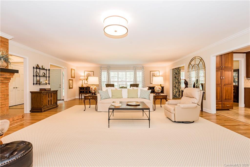 1001 Lansdowne Road Charlotte, NC 28270 - Photo 3 of 37 a living room with furniture and a large window