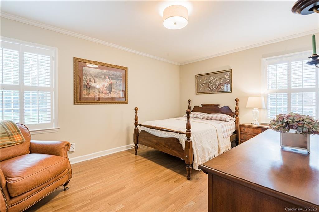 1001 Lansdowne Road Charlotte, NC 28270 - Photo 21 of 37 a bedroom with furniture and a window