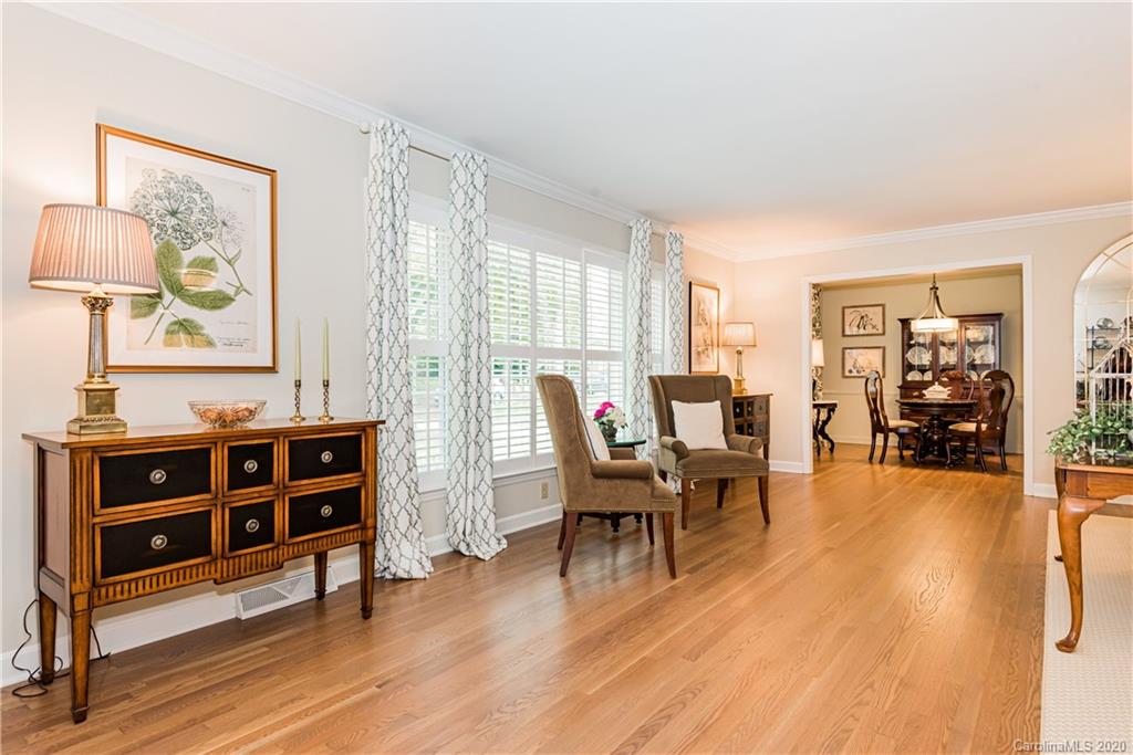 1001 Lansdowne Road Charlotte, NC 28270 - Photo 8 of 37 a view of a livingroom with furniture and wooden floor