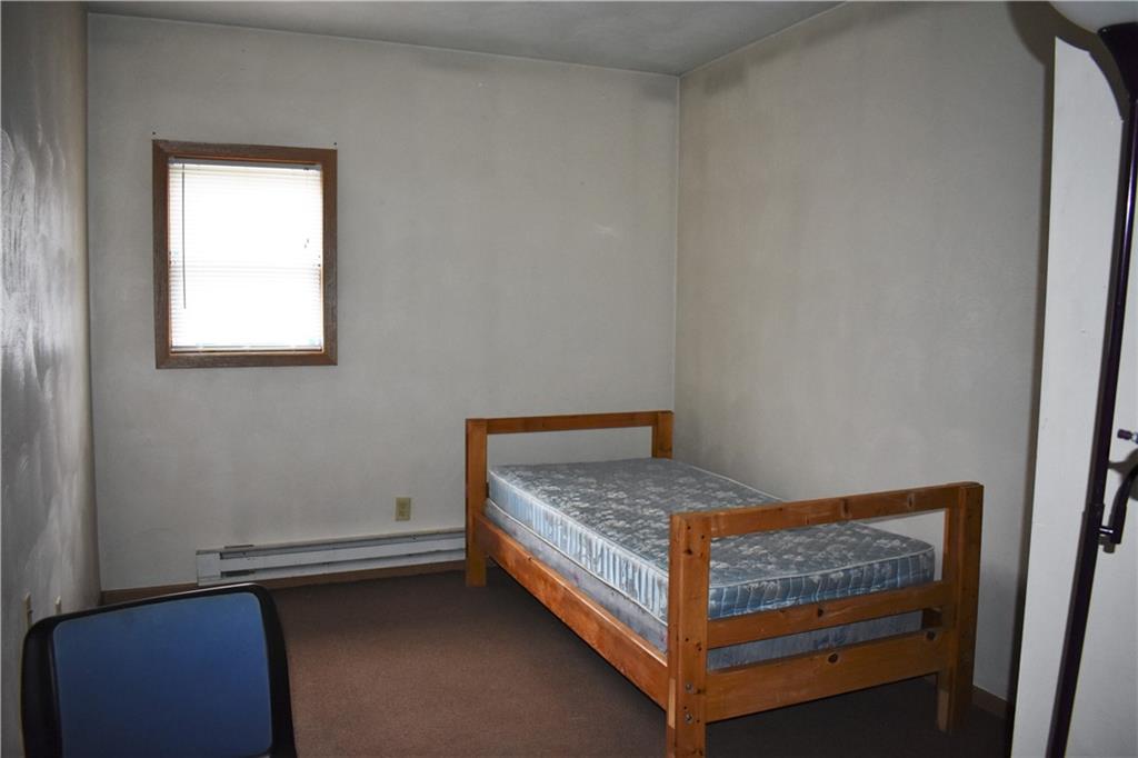 757 Locust Street Indiana, PA 15701 - Photo 10 of 19 a bedroom with a bed and window