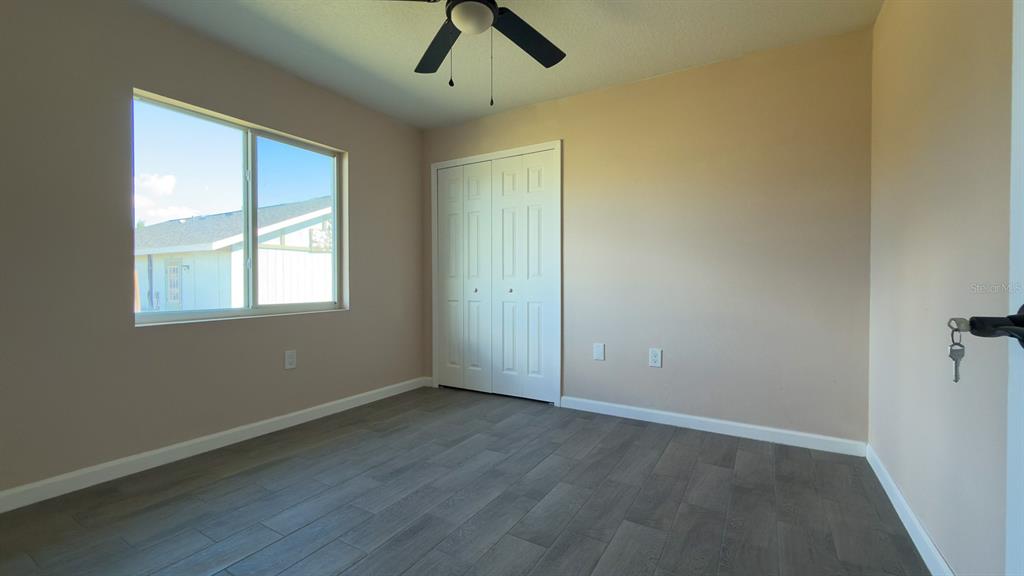 11154 Pendleton Avenue Englewood, FL 34224 - Photo 20 of 32 an empty room with a window